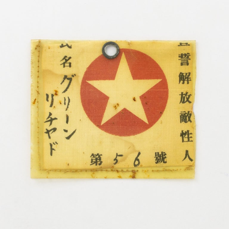 Item #100958 The identity tag or pass of one Richard Green, a prisoner-of-war of the Japanese during the Second World War. Prisoner-of-War Artefact.