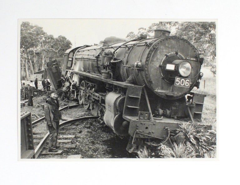 Item #102439 A group of ten vintage photographs featuring the derailment of a South Australian 500 Class Mountain-type locomotive (Number 506). Railways.
