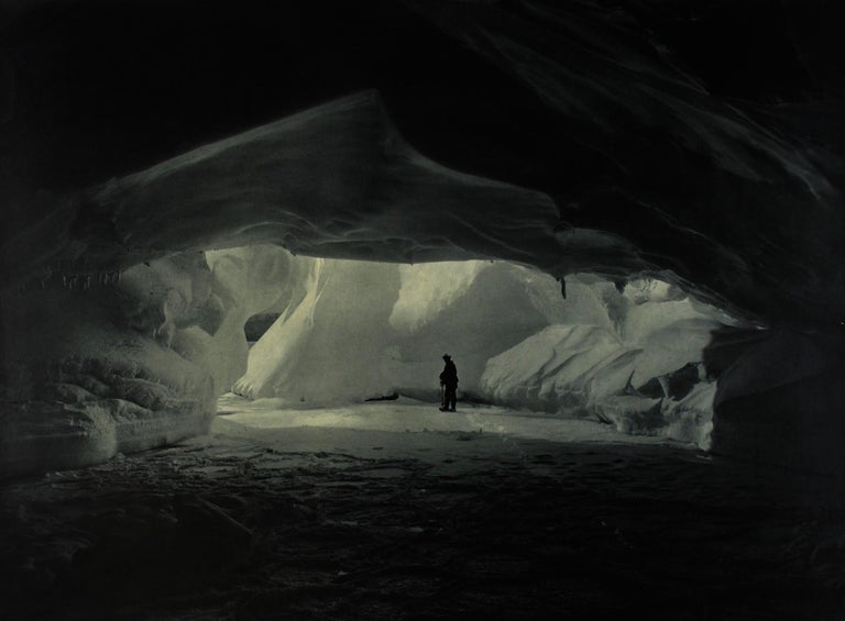 Item #105268 'A Cavern beneath the Coastal Ice-Cliffs' [Australasian Antarctic Expedition, 1911-1914]. A vintage blue-toned carbon print, 433 x 583 mm, mounted on flush-cut card; in fine condition. Frank HURLEY, Australia.