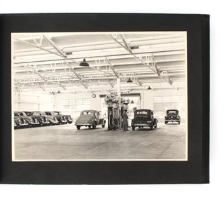 An album of photographs of the new showroom and workshop areas of Dalgety and Company's Ford dealership in Adelaide, circa 1938