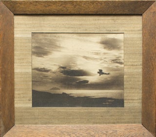 Item #107816 A striking sepia-toned photograph of a Bristol F.2B biplane piloted by pioneering...