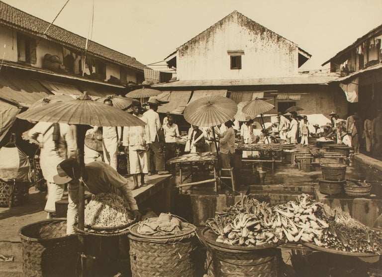 Item #108641 'A Javanese Market Place' [a vintage sepia-toned carbon print on the original flush-cut thick card mount]. Frank HURLEY.