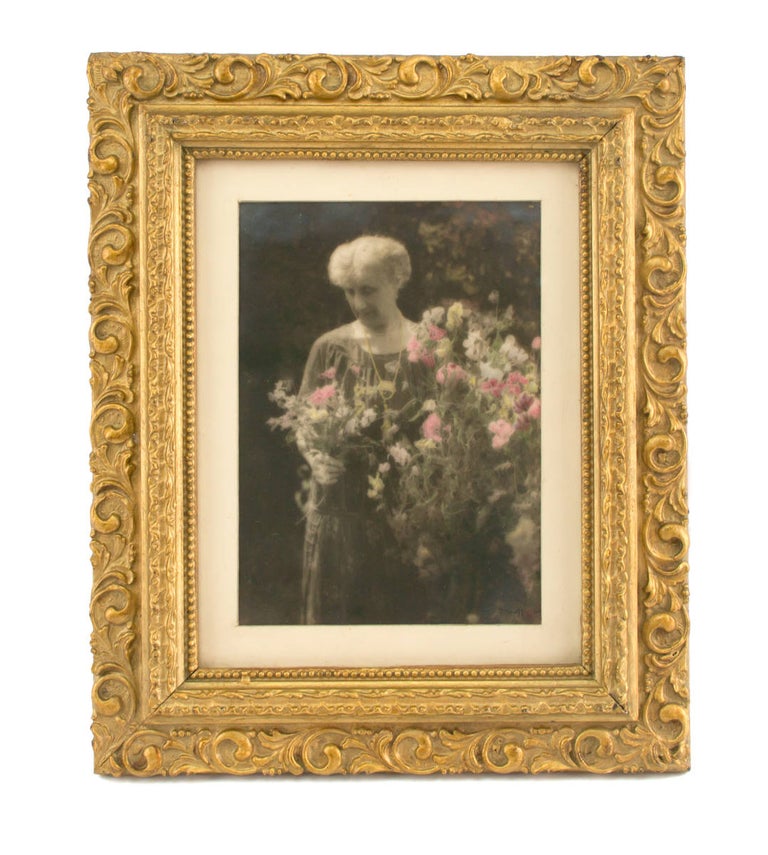 Item #109757 Portrait of Caroline Marcus [John Kauffmann's sister], with Sweet Peas. A vintage hand-coloured gelatin silver photograph (visible image size 198 × 140 mm). John KAUFFMANN.