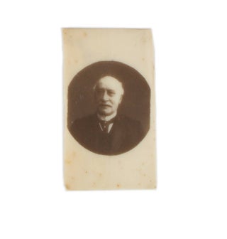 Item #109909 A small sepia-toned portrait photograph printed on ivory (image size, a 26 mm circle...