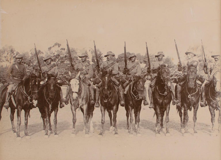 Item #111044 A group portrait photograph of Captain Edward Richman and seven troopers of the 2nd South Australian (Mounted Rifles) Contingent in Adelaide in 1900. One of the troopers is Henry Harbord Morant. Henry Harbord 'Breaker' MORANT.