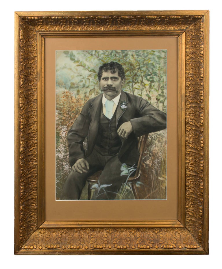 Item #111100 An extremely large hand-painted vintage opalotype (a gelatin silver photograph on opaque white glass) of an Indigenous Australian man on what must surely have been his wedding day. Indigenous Portraiture.