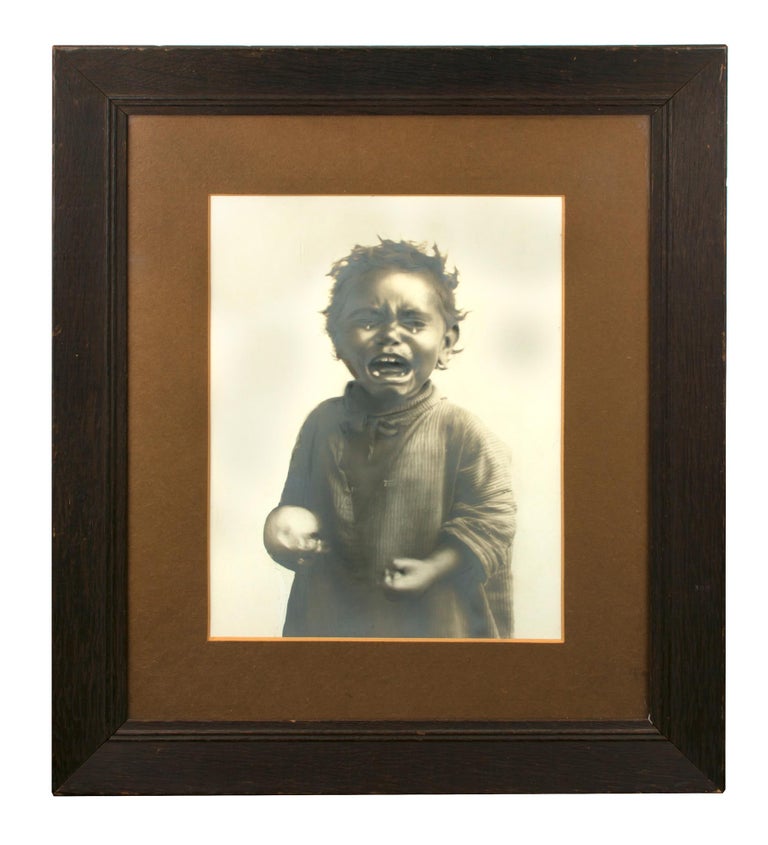 Item #111101 A very unusual large-format vintage photograph of a young Indigenous Australian child who is not happy, to say the least. Indigenous Portrait.