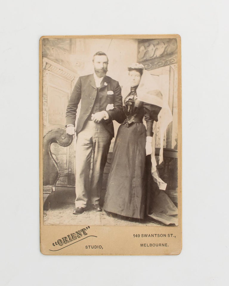 Item #111795 A cabinet card photograph of Alfred Deakin and his wife Pattie, possibly of them on their wedding day, 3 April 1882. fifth second, seventh Prime Minister of Australia.