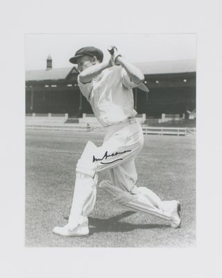 Item #114802 A signed photograph (black and white, 253 × 203 mm) of Don Bradman executing a...
