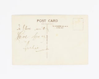 A vintage postcard-format portrait photograph inscribed in ink on the verso 'To Olive with Love from "Archie"'