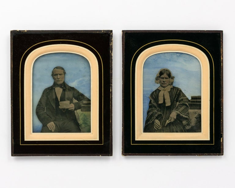 Item #114885 An extraordinary pair of half-plate ambrotype portraits of a couple (possibly husband and wife), circa 1850s. Ambrotypes.