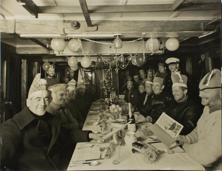 Item #114974 Christmas Dinner on board the SY 'Discovery', 1930. BANZARE, Frank HURLEY.
