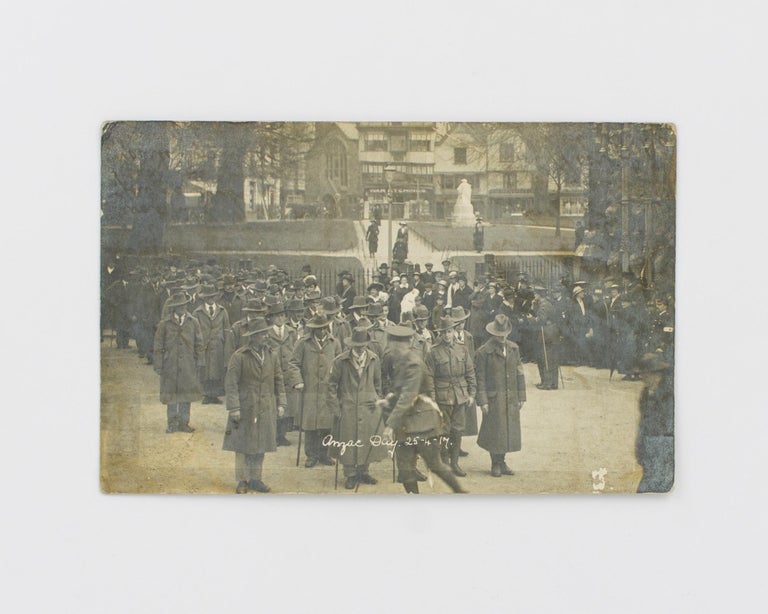 Item #115281 A postcard-format gelatin silver photograph of an Anzac Day commemoration in England in 1917; a sombre group of Australian walking wounded are featured prominently. 1917 Anzac Day.