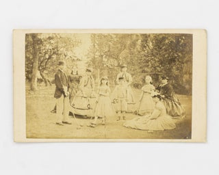 Item #115310 A carte de visite of a large Victorian-era family group on a croquet court. Various...