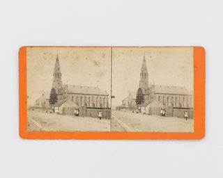 Item #115335 A stereophotograph of an unidentified streetscape with a large church, captioned on...