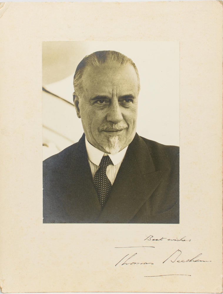 Item #115531 A large-format vintage photograph, inscribed and signed on the mount ('Best wishes, Thomas Beecham'). Sir Thomas BEECHAM, 2nd Baronet, English conductor and impresario.