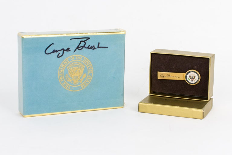 Item #116916 A unopened double-deck of Air Force Two playing cards, with the unbroken outer seal signed by George Bush during his vice-presidency. Vice-President of the USA, 41st President of the USA.