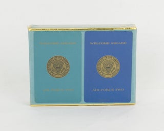 A unopened double-deck of Air Force Two playing cards, with the unbroken outer seal signed by George Bush during his vice-presidency