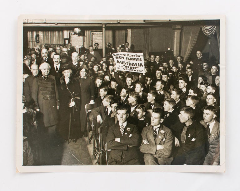 Item #118537 A vintage photograph featuring Salvation Army General Bramwell Booth and some of the 'ninety boys who are sailing for Australia under the Salvation Army Immigration Scheme'. Boy Farmers for Australia.