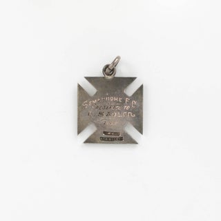A silver medallion 'Presented to R. Sadler 1884' by the Semaphore Football Club