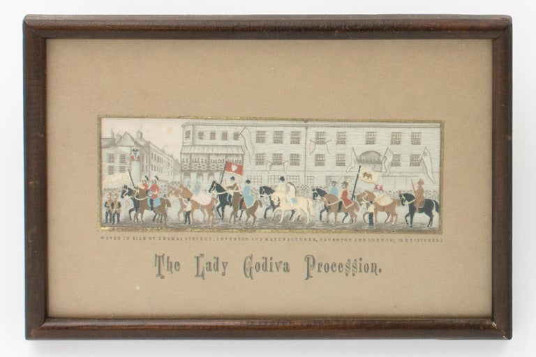 Item #120381 The Lady Godiva Procession [a landscape Stevengraph depicting a procession through the streets of Coventry, of Lady Godiva and numerous soldiers on horseback, with Peeping Tom keeping an eye on things]. Stevengraph.
