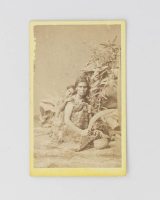 Item #120600 A carte de visite portrait photograph, a studio tableau of an Indigenous woman...