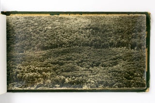 An album of 87 large-format aerial photographs of the New Guinea coastline, circa 1943