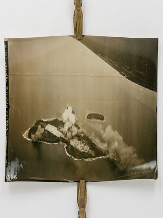 Two aerial photographs of bombing raids on Wewak and Wakde Island