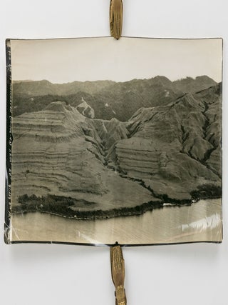 Two aerial photographs of bombing raids on Wewak and Wakde Island
