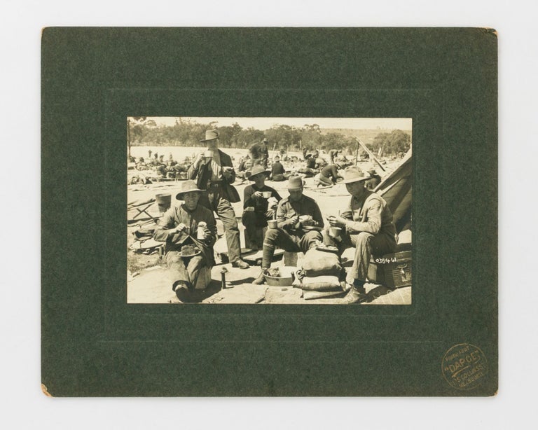 Item #121575 A photograph of a group of young men enjoying an al fresco meal at (we believe to be) Broadmeadows Army Camp during the First World War. Victoria Broadmeadows Army Camp.