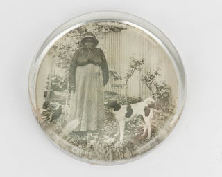 Item #121725 A glass paperweight featuring a photographic portrait of Fanny, an Indigenous...