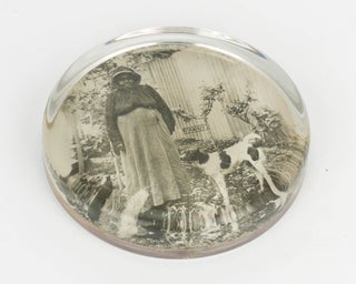 A glass paperweight featuring a photographic portrait of Fanny, an Indigenous Australian woman