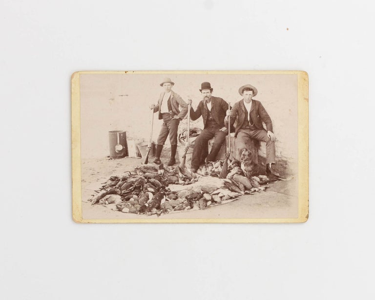 Item #121726 A photograph depicting a day in the life of three shooters at Bool Lagoon in south-eastern South Australia, circa 1900. Duck Hunting.