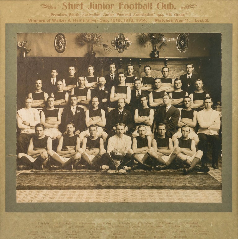 Item #122261 A vintage photograph of the 'Sturt Junior Football Club. Premiers South Australian Junior Football Association, 1914. "B Grade." Winners of Walker & Hall's Silver Cup, 1912, 1913, 1914. Matches Won 11. Lost 2'. 1914 Sturt Junior Football Club.