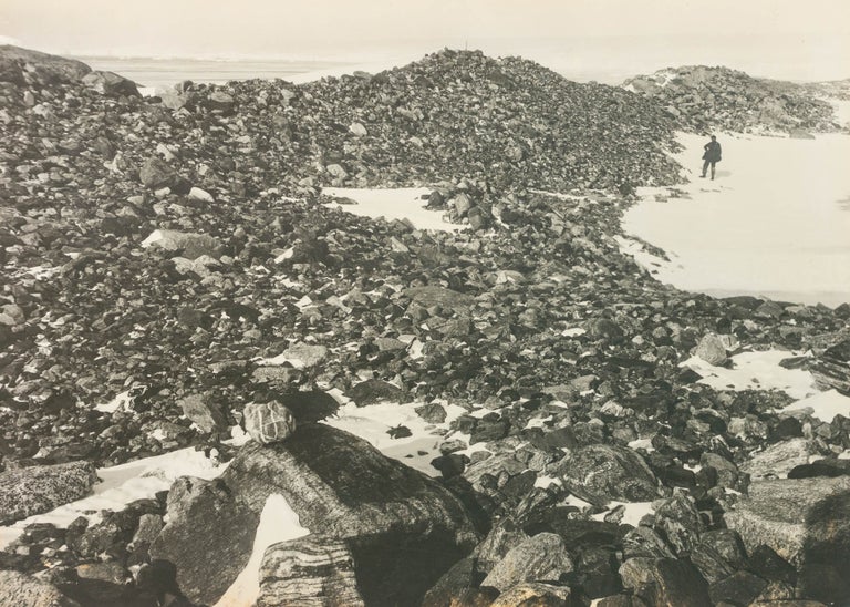Item #122914 'A Terminal Moraine [At the wasting face of the great ice-sheet at Cape Denison]'. Australasian Antarctic Expedition, Frank HURLEY.
