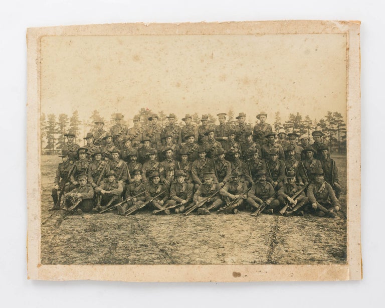 Item #125976 An original photograph of a group of Australian soldiers in uniform. Military Group Portrait.