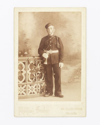 Item #128029 A South Australian cabinet card photograph of a man in military uniform holding a...
