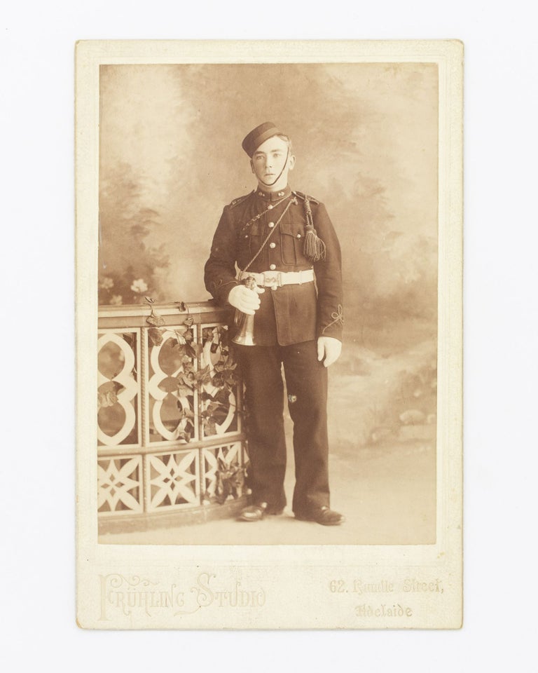 Item #128029 A South Australian cabinet card photograph of a man in military uniform holding a bugle. Militaria.