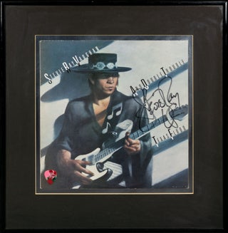Item #136220 Stevie Ray Vaughan and Double Trouble. Texas Flood [a signed album sleeve mounted...