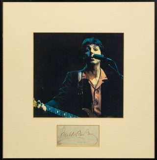 Item #136230 The autograph of Paul McCartney displayed in a frame with a reproduction colour...