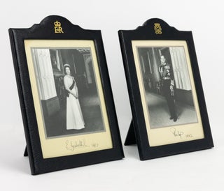 Item #136843 A pair of portrait photographs of Queen Elizabeth II and Prince Philip in matching...
