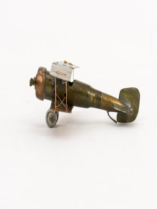 A scratch-built model of a Sopwith Camel, one of the most significant and famous of all First World War aircraft, fashioned around a bullet as the fuselage