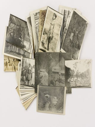 Item #140780 A collection of 36 vintage photographs of Papua New Guinea, with the majority of...