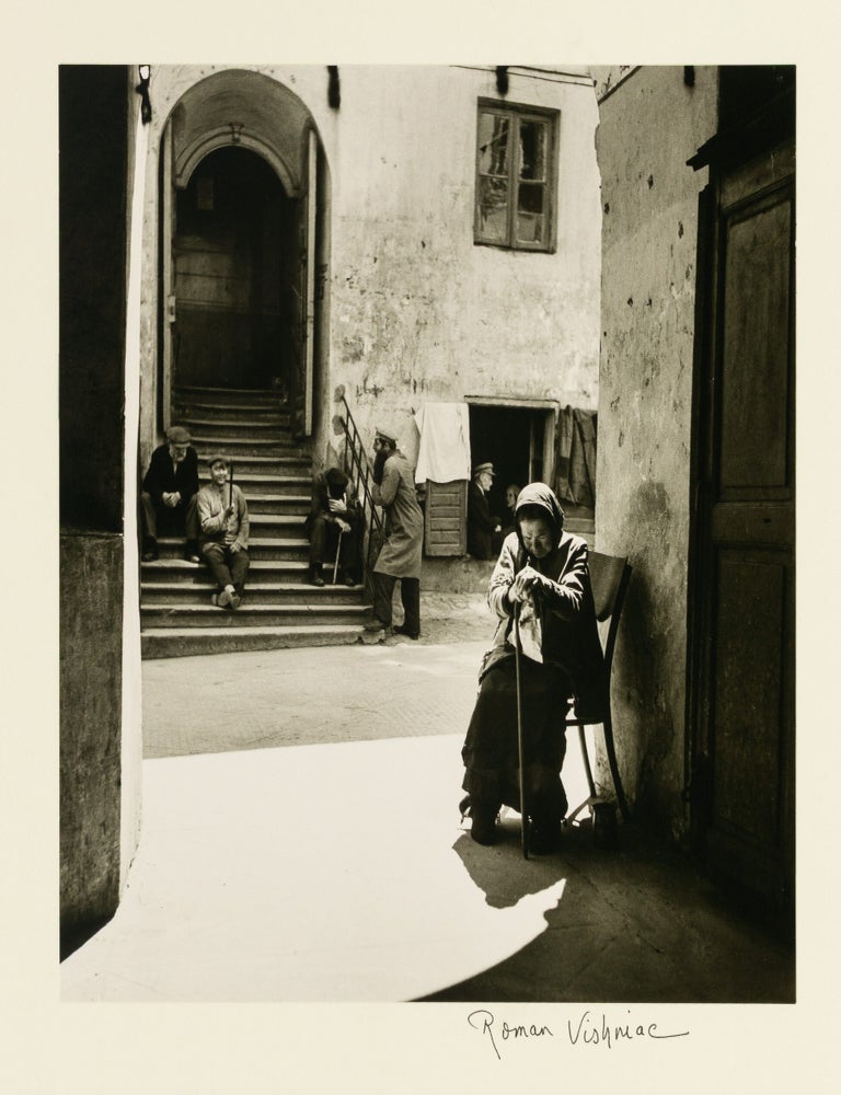 Item #145046 'Synagogue Court, Vilna, 1938' [an unnumbered example of Plate 12 from 'The Vanished World' Portfolio]. Roman VISHNIAC.