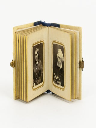 Item #146011 A miniature photograph album containing 10 gem-format portrait photographs, circa...