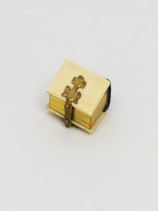 A miniature photograph album containing 10 gem-format portrait photographs, circa 1860s
