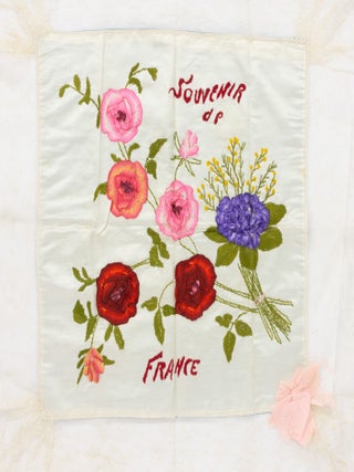 Seven embroidered silk cushion covers collected by Australian soldiers on active service during the Second World War
