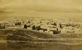 A large four-panel photographic panorama of Dunedin, Otago, New Zealand