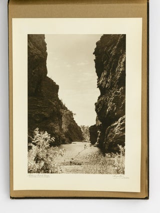 An album of 25 bromoil prints of Central Australia, individually captioned and signed by the photographer