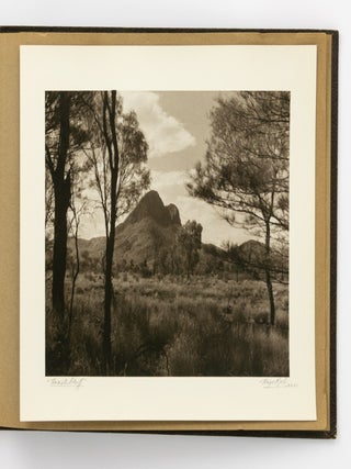 An album of 25 bromoil prints of Central Australia, individually captioned and signed by the photographer